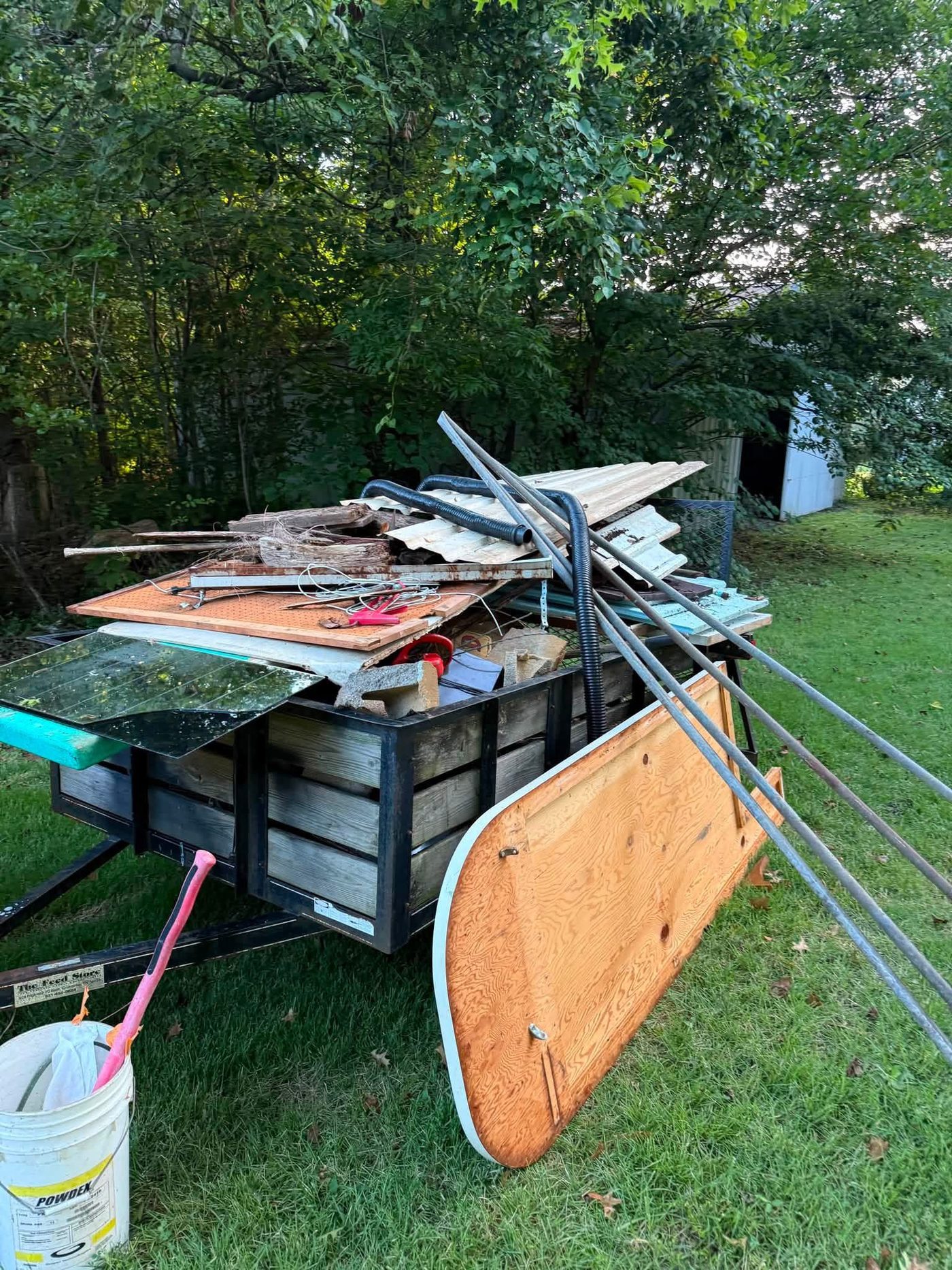 Trailer loaded with junk and debris ready for haul-away